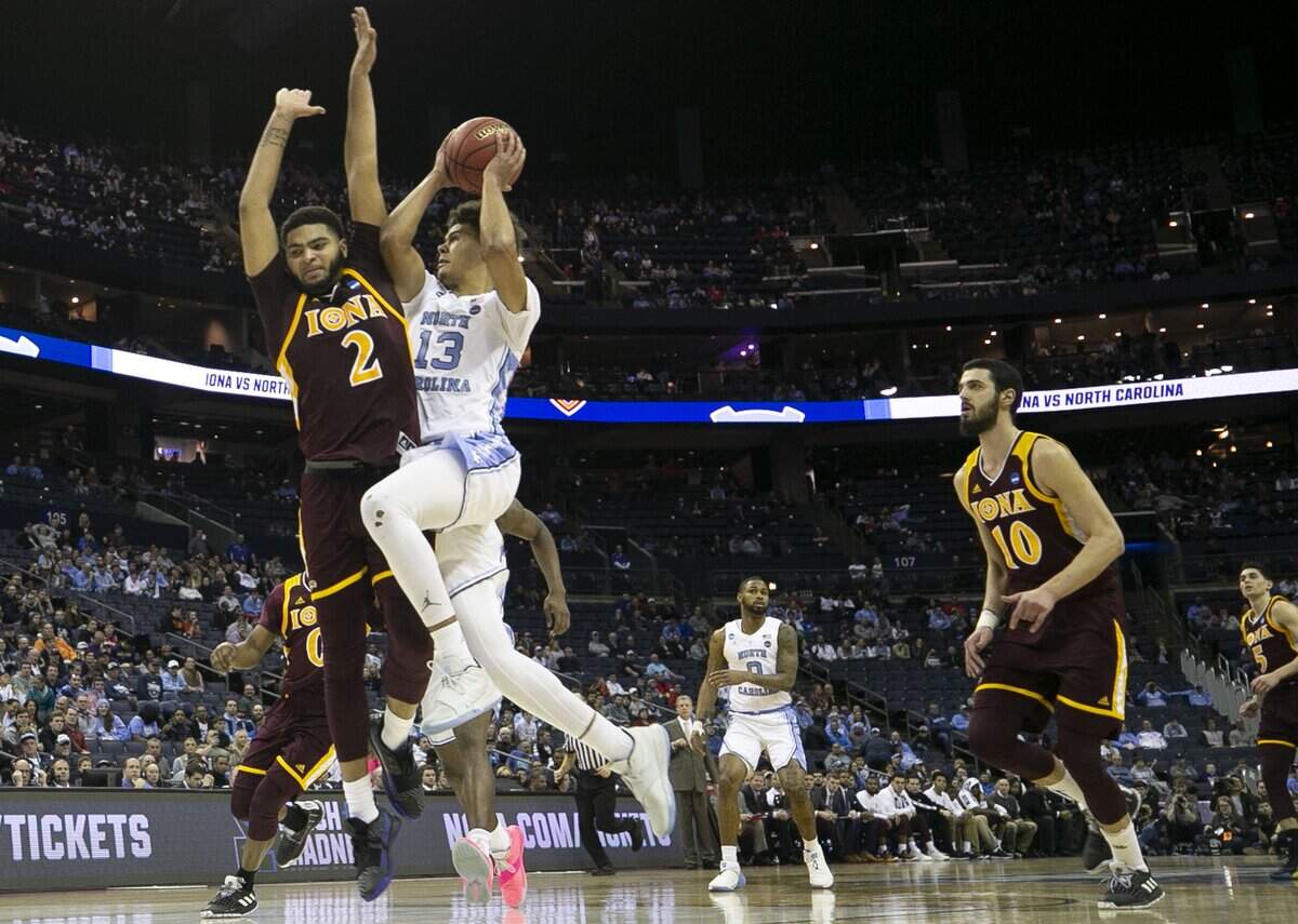 North Carolina’s Cameron Johnson (13) drives to the basket against Iona’s E.J. Crawford (2) during the second half on Friday, March 22, 2019 at Nationwide Arena in Columbus, Ohio. Johnson lead North Carolina with 21 points in their 88-73 victory over Iona.