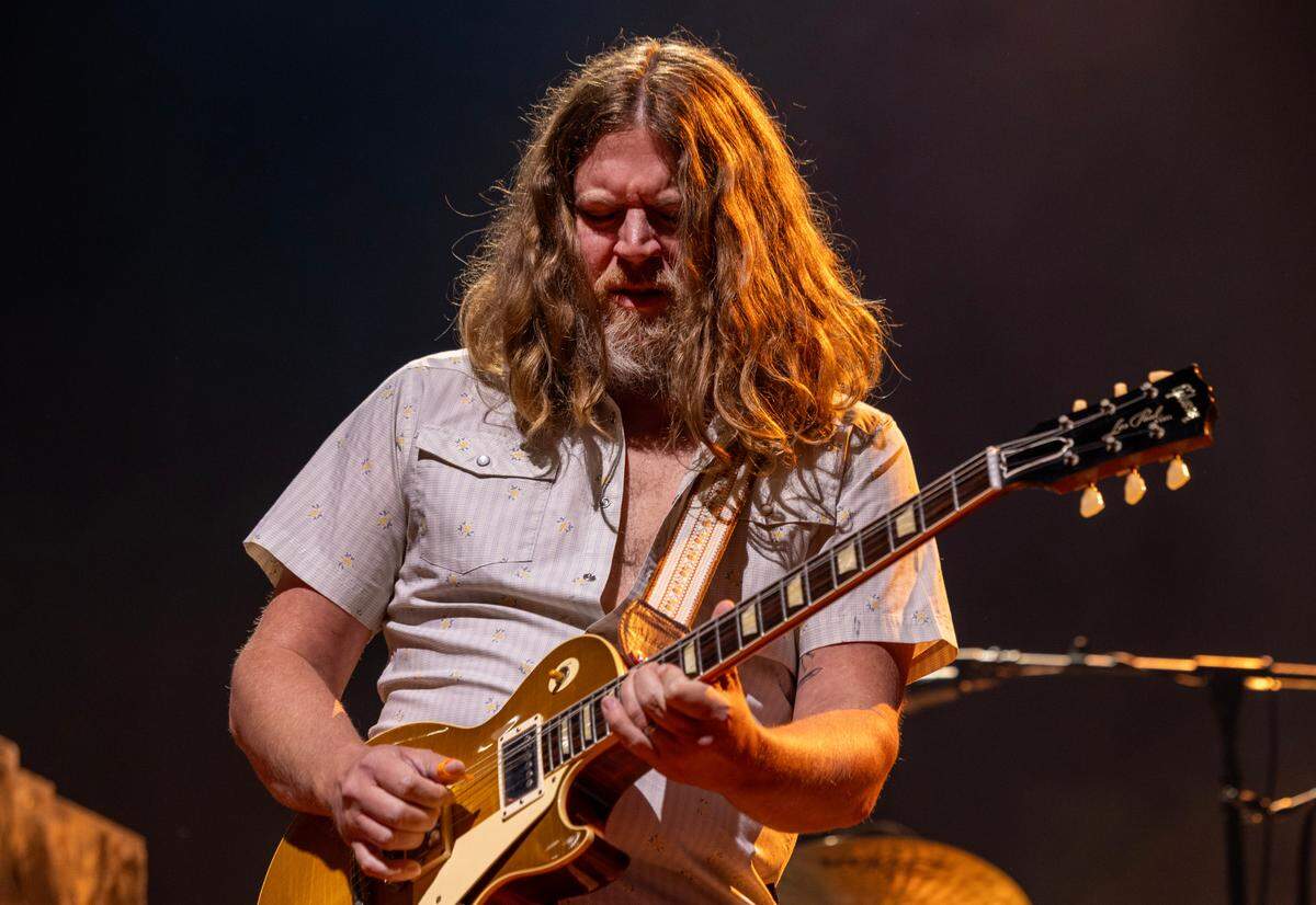 C.J. Cain cuts loose on the guitar as Tyler Childers plays Raleigh, N.C.’s Coastal Credit Union Music Park at Walnut Creek, Wednesday night, April 23, 2025.