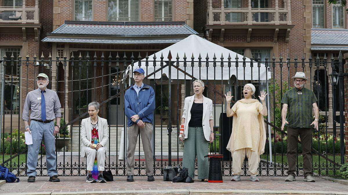 Activists with NC Warn stage a protest at the Governor’s Mansion in Raleigh, N.C., Wednesday over perceived kid-gloves treatment of Duke Energy.