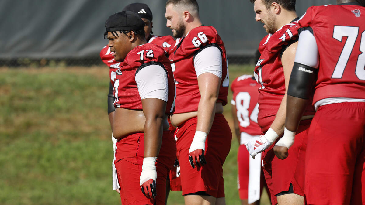 N.C. State’s Spike Sowells (72) lines up with the offensive line during the Wolfpack’s first fall practice Wednesday, July 30, 2025.