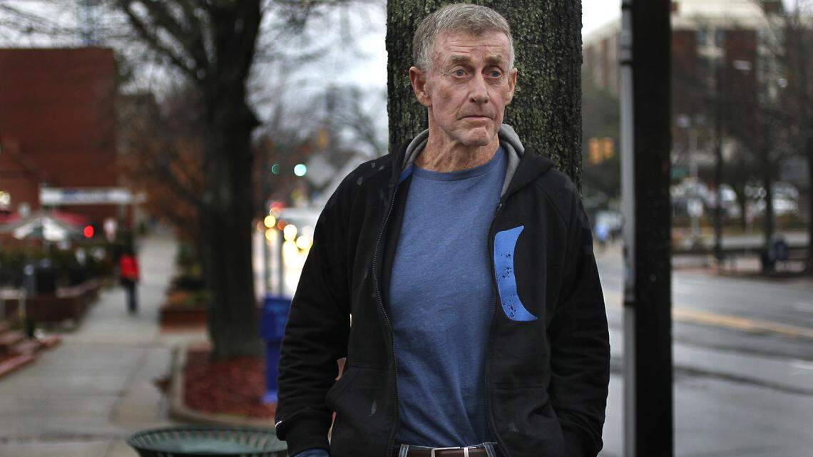Michael Peterson stands outside his lawyer's office on Franklin Street in Chapel Hill Wednesday Dec. 21, 2011 shortly after he was released from house arrest. Peterson, 68 was released from prison after eight years last week when testimony by former SBI agent Duane Deaver was found to be perjured testimony by Judge Orlando Hudson.