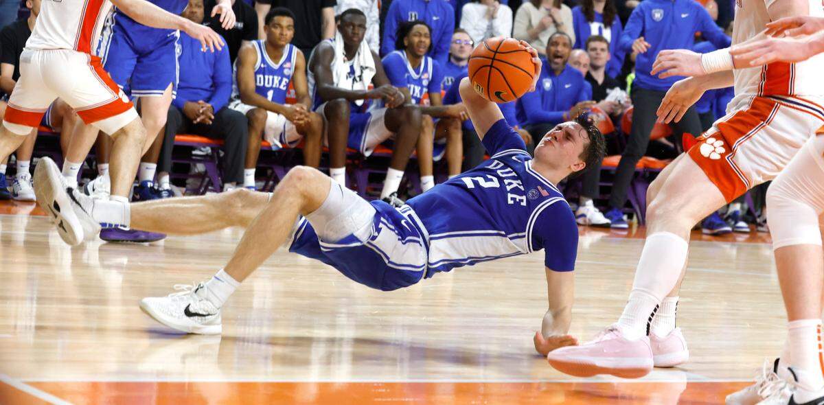 Duke’s Cooper Flagg (2) slips and turns over the ball in the final minute of Clemson’s 77-71 victory over Duke at Littlejohn Coliseum in Clemson, S.C., Saturday, Feb. 8, 2025.