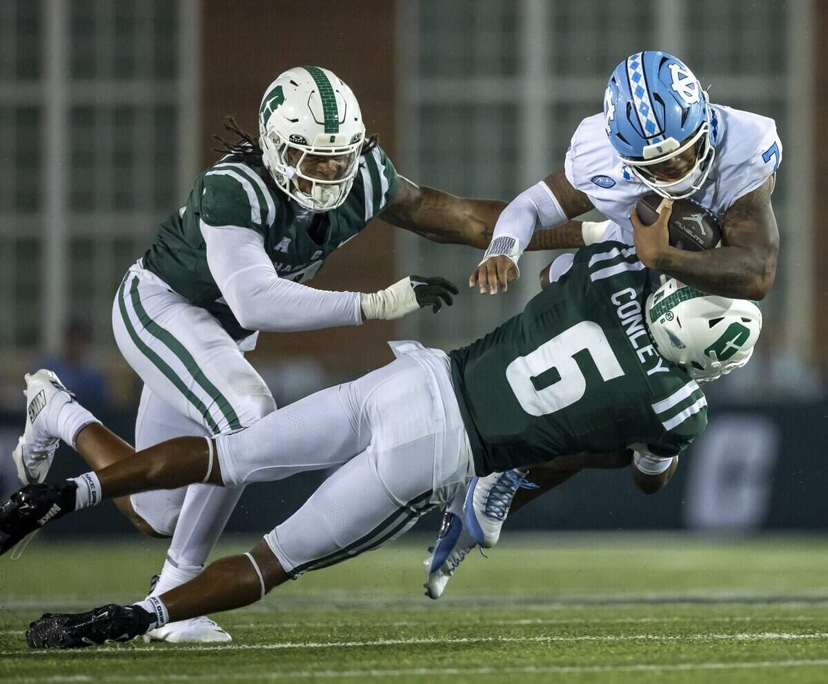 UNC Charlotte defensive back Jo’Qurious Conley (6) stops North Carolina quarterback Gio Lopez (7) after a four-yard gain in the third quarter on Saturday, September 6, 2025 at Jerry Richardson Stadium in Charlotte, N.C.