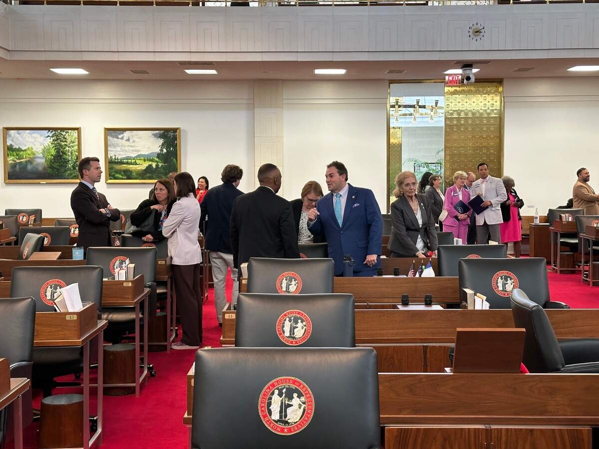 House Minority Leader Robert Reives talks with House Rules Committee Chairman John Bell after a voting session on Wednesday, April 2, 2025.