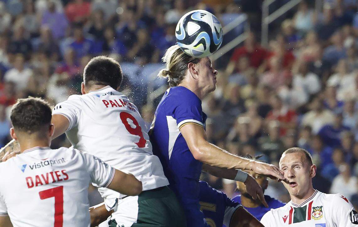 Chelsea’s Conor Gallagher, right, battles Wrexham’s Ollie Palmer for a header during the second half of Chelsea Football Club’s 5-0 victory over Wrexham AFC in a friendly match at Kenan Stadium in Chapel Hill, N.C., Wednesday, July 19, 2023.