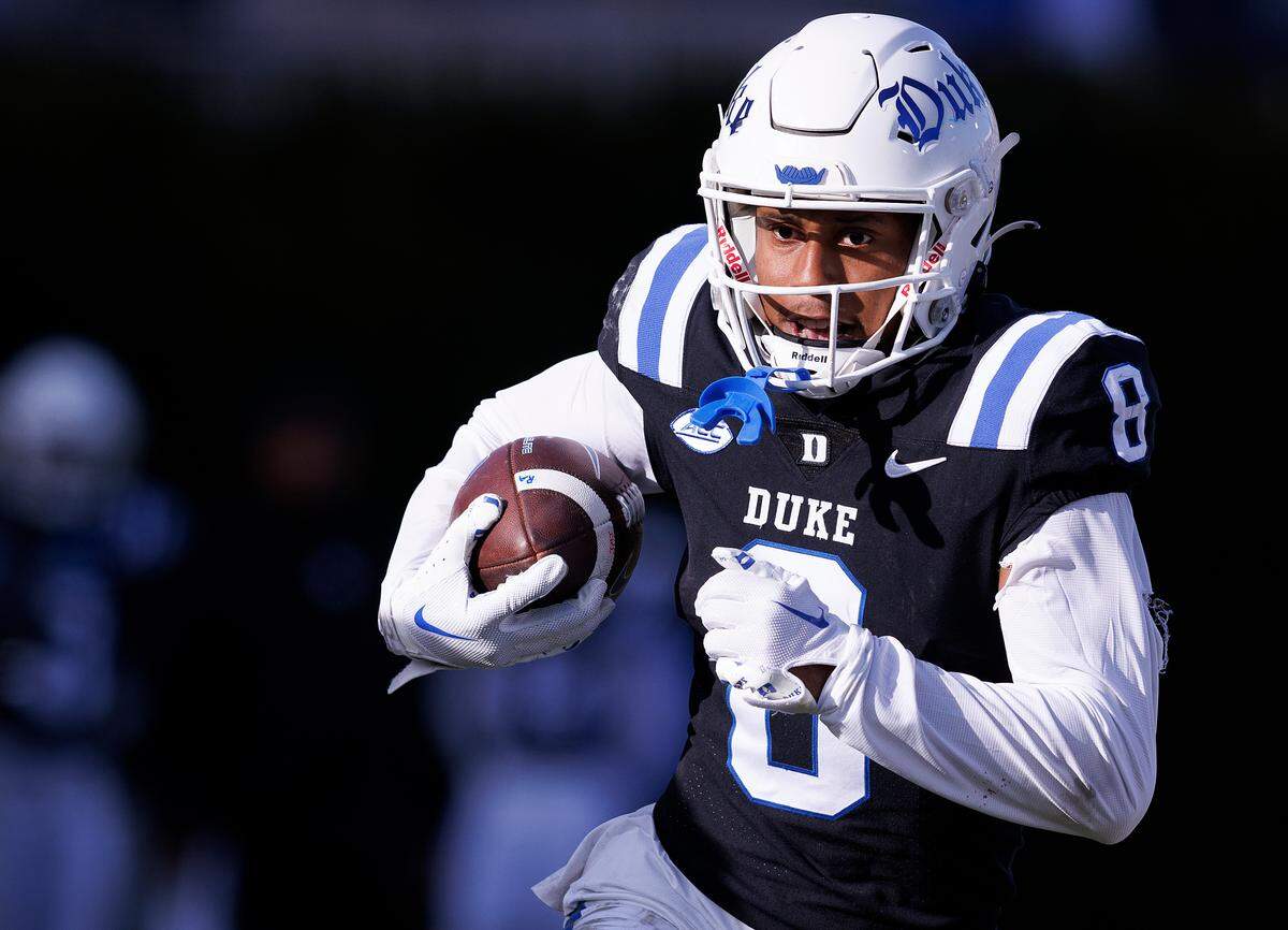 Duke’s Jordan Moore runs the ball during the second half of the Blue Devils’ 30-19 win over Pittsburgh on Saturday, Nov. 25, 2023, at Wallace Wade Stadium in Durham, N.C.