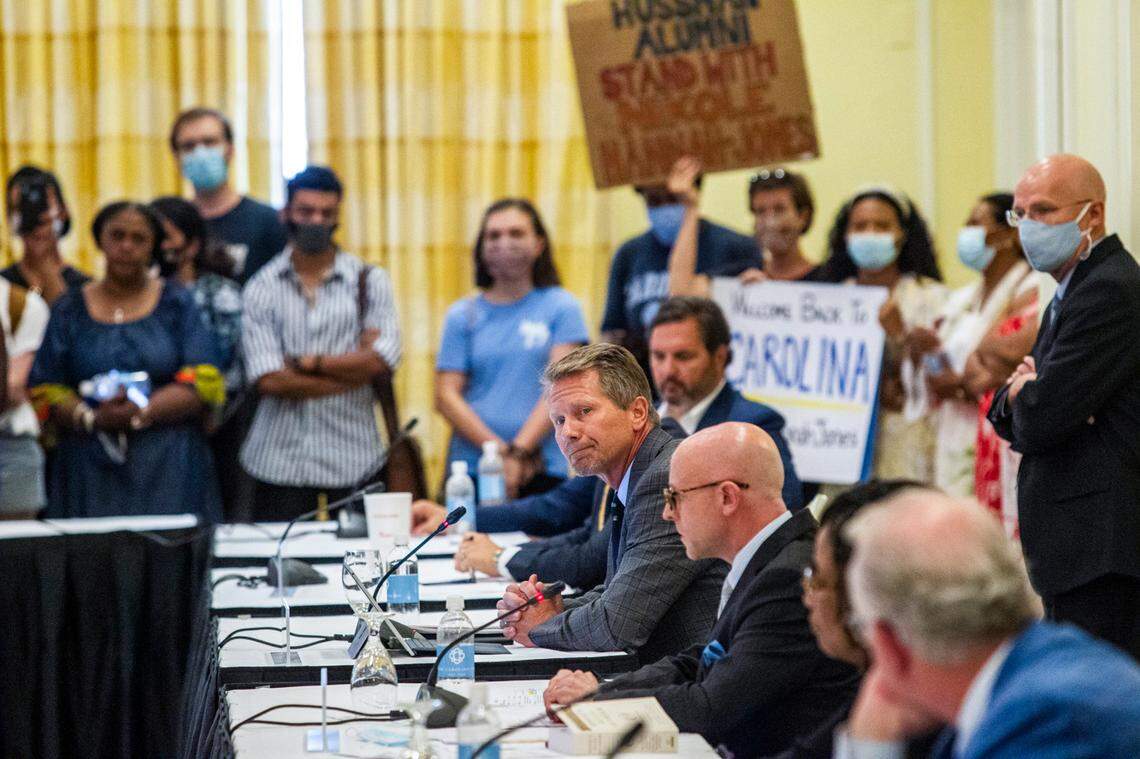 Demonstrators watch as UNC-Chapel Hill trustees voted to approve tenure for distinguished journalist Nikole Hannah-Jones during a meeting Wednesday afternoon, June 30, 2021 at the Carolina Inn in Chapel Hill.