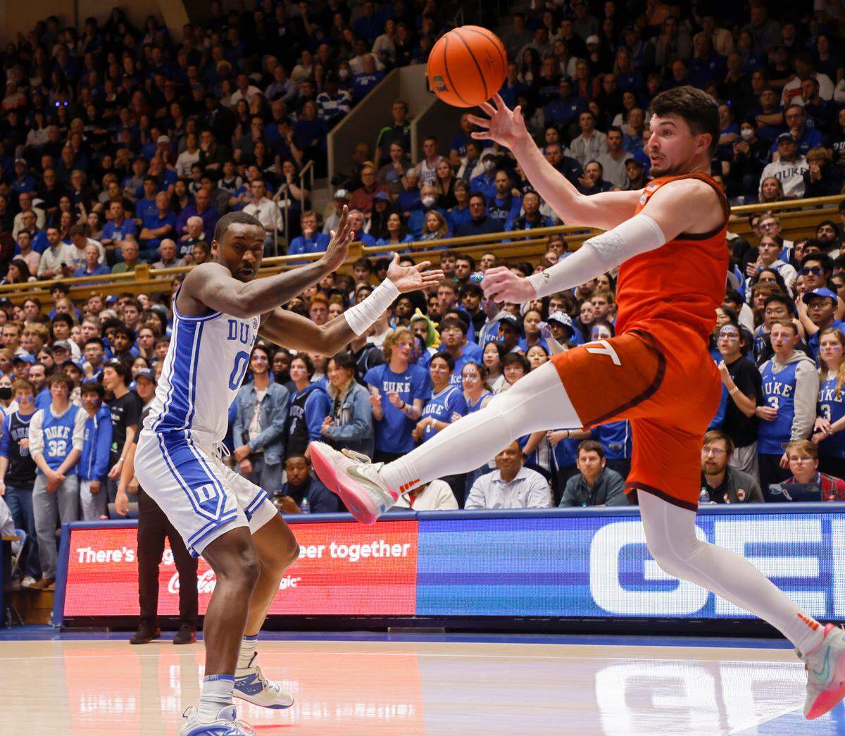 Virginia Tech’s Hunter Cattoor leaps to save the ball from going out of bounds during the first half of the Blue Devils’ 81-65 win over Virginia Tech on Saturday, Feb. 25, 2023, at Cameron Indoor Stadium in Durham, N.C.