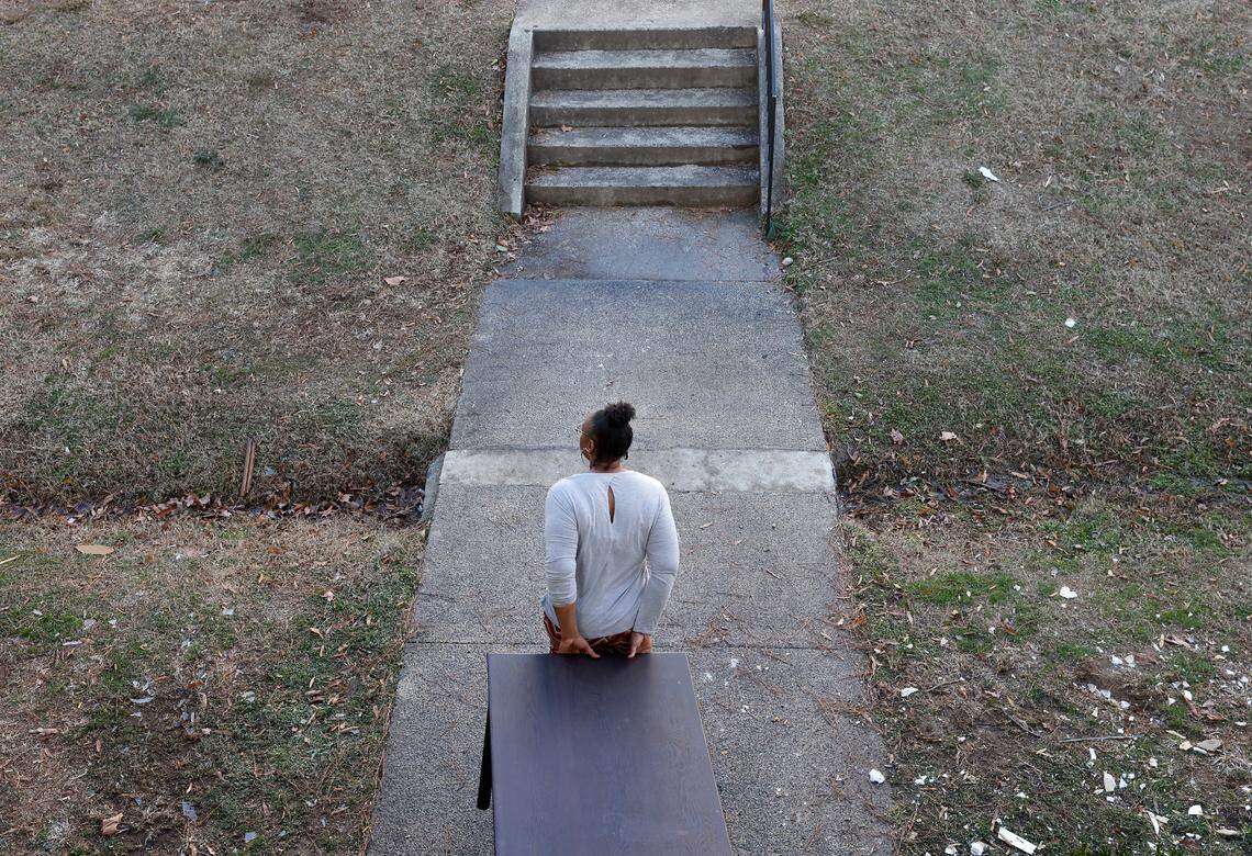 Portia Watson moves belongings out of her apartment in Durham, N.C. on Friday, Dec. 30, 2022. Watson says she received notice that her lease would not be renewed after she took in neighbors from the same complex.