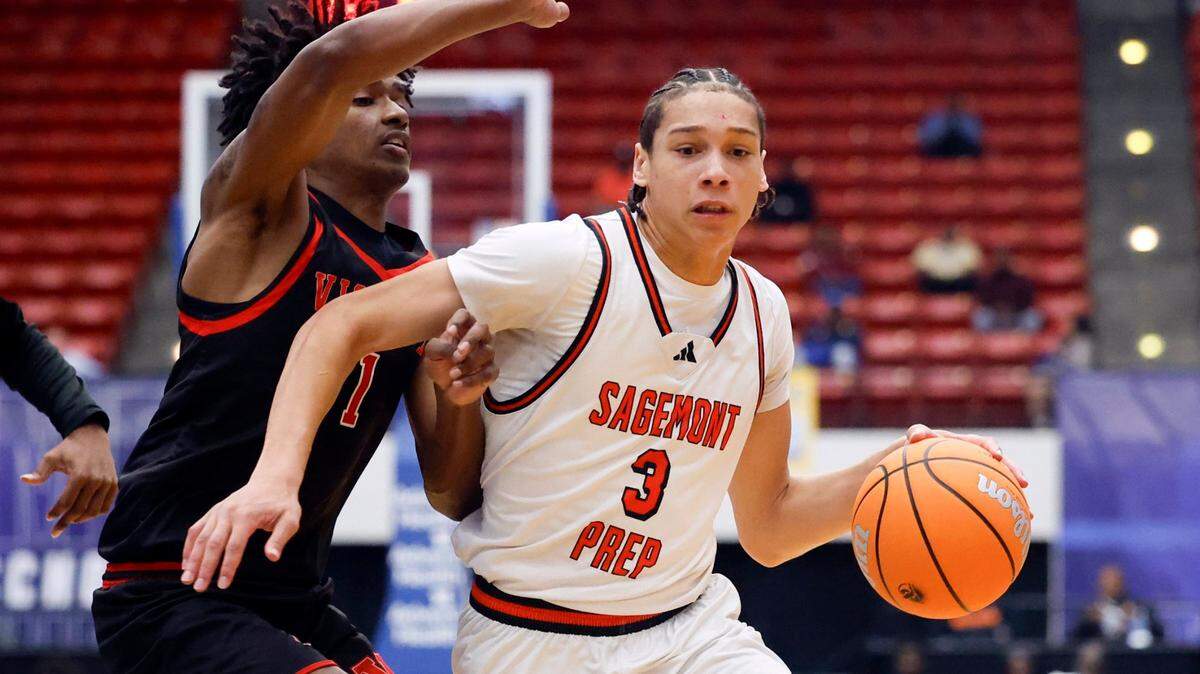 Sagemont’s Matthew Able (3) drives the all as Victory Christian Academy’s Jozia Scott (1) defends in the first half during boy’s 1A basketball State Final of the Florida High School State Championships at the RP Funding Center in Lakeland, Florida on Thursday, February 27, 2025.
