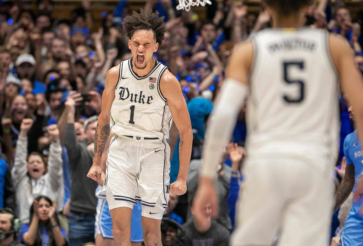 Duke’s Dereck Lively II (1) reacts after a dunk to give the Blue Devils a 59-57 lead with 1:32 to play and helping to secure their 63-57 win over North Carolina on Saturday, February 4, 2023 at Cameron Indoor Stadium in Durham, N.C.