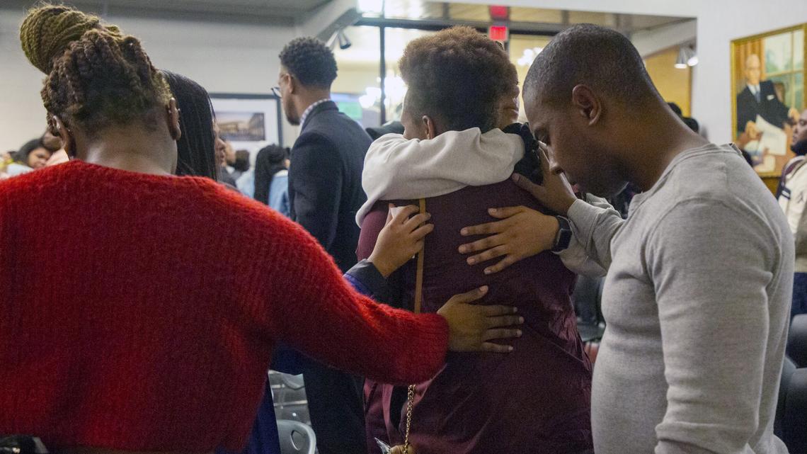 N.C. Central University sophomore T’ona McBride is embraced by friends after a vigil for Trevor VanDyke, a freshman defensive back for the school’s football team. He was fatally shot in 2020 at an apartment complex two miles south of campus.