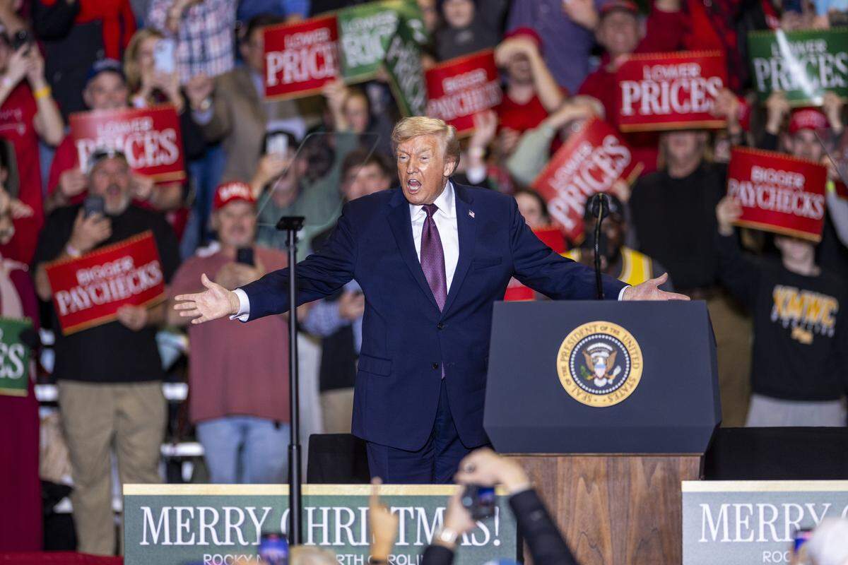 President Donald Trump takes the stage during a rally at the Rocky Mount Event Center in Rocky Mount on Friday, Dec. 19, 2025. 