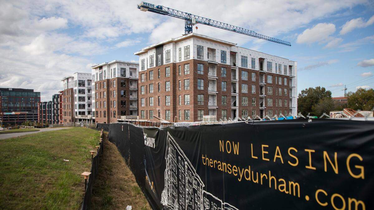 Construction crews work on The Ramsey apartment complex in Durham, NC on Oct. 29, 2021. The Raleigh and Charlotte areas are among the fastest growing rental markets in the U.S. according to the National Apartment Association. A study by the group showed Raleigh needs to build 74,323 new apartments by 2030 to fill demand. Charlotte needs at least 72,000 by 2030.