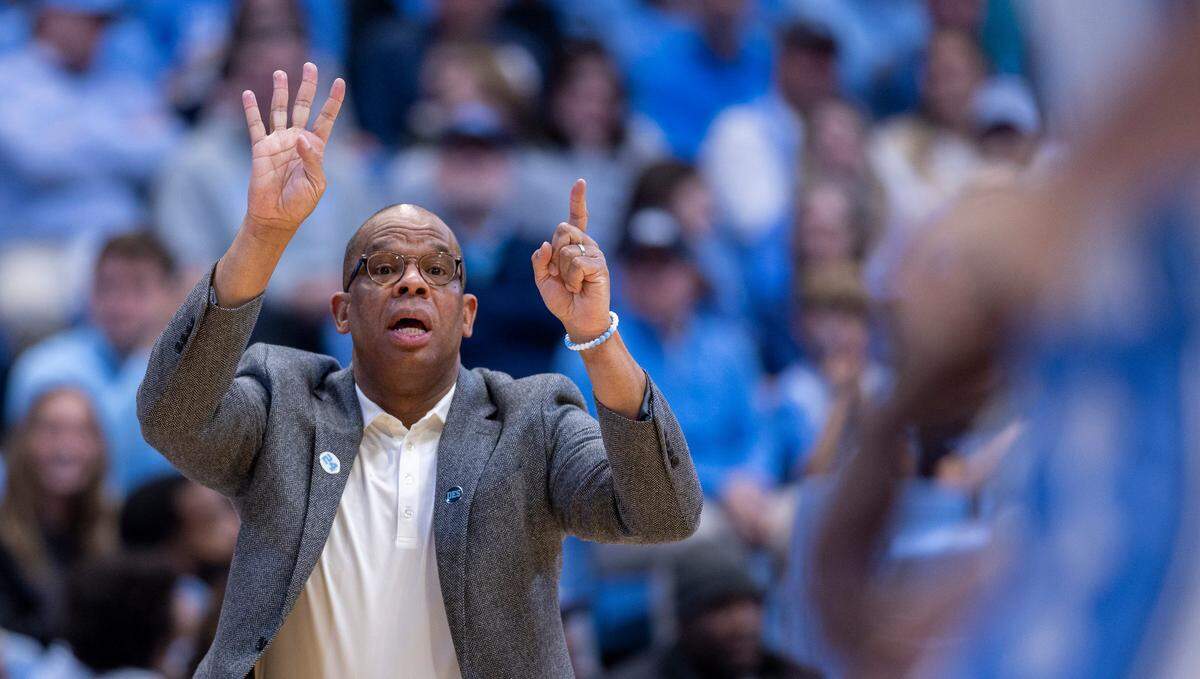 North Carolina coach Hubert Davis directs his team on offense during the first half against Charleston Southern on Friday, December 29, 2023 at the Smith Center in Chapel Hill, N.C.