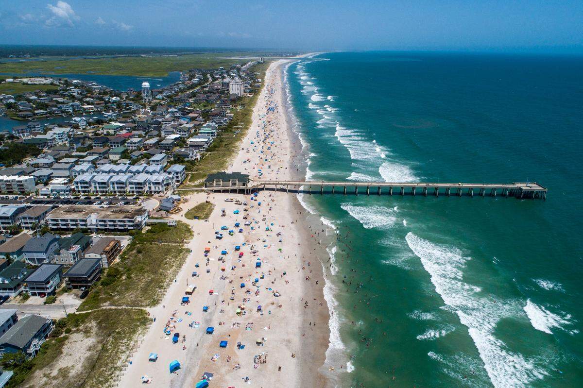 Visit Wrightsville Beach for blue waters and quiet beaches — and make sure to support local while you are there. 