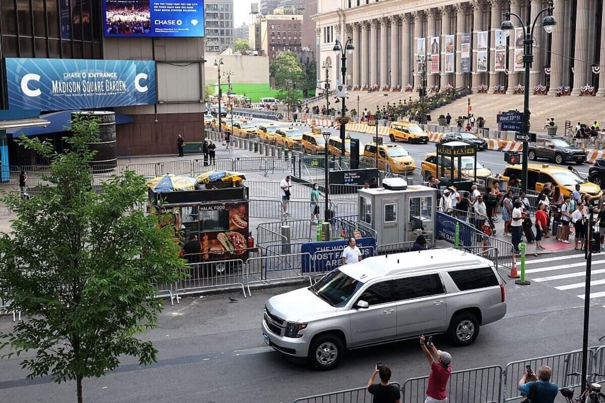 A silver SUV, believed to be carrying US singer-songwriter Taylor Swift, arrives outside Madison Square Garden, the reported venue for the wedding celebrations Swift and pro-athlete Travis Kelce, in New York City on July 3, 2026. Swift and Kelce's official wedding plans are tightly under wraps, but New York is bracing to host the celebrity marriage of the year this week at Madison Square Garden. The wedding will reportedly take place Friday with a star-studded guest list of around 1,000, including models Gigi Hadid and Cara Delevingne, singer Selena Gomez, and actress Zoe Kravitz -- all known to be close Swift pals -- and Kelce's Kansas City Chiefs teammates. (Photo by CHARLY TRIBALLEAU / AFP via Getty Images)
