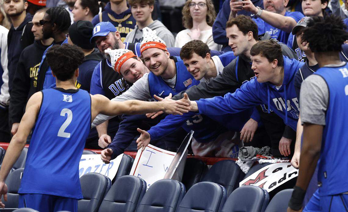 Fans greets Duke’s Cayden Boozer (2) as he walks off the court after Duke basketball’s open practice during ESPN’s College GameDay at Capital One Arena in Washington, D.C., Saturday, Feb. 21, 2026.