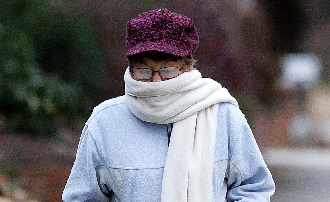 Carolyn Dillon bundles up while walking along North Gregson Street as temperatures reach the low 20s on Tuesday, Jan. 21, 2025, in Durham, N.C. 