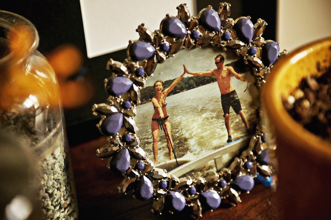 A photo of Michael Thor, right, waterskiing with his wife, Sarah Santoro Thor, in their downtown Raleigh apartment. The couple who have thrived on leading physically active lives have now had to learn how to live a new life together after Michael Thor’s motorcycle accident.
