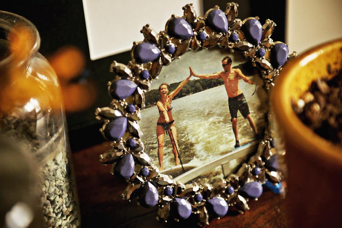 A photo of Michael Thor, right, waterskiing with his wife, Sarah Santoro Thor, in their downtown Raleigh apartment. The couple who have thrived on leading physically active lives have now had to learn how to live a new life together after Michael Thor’s motorcycle accident.