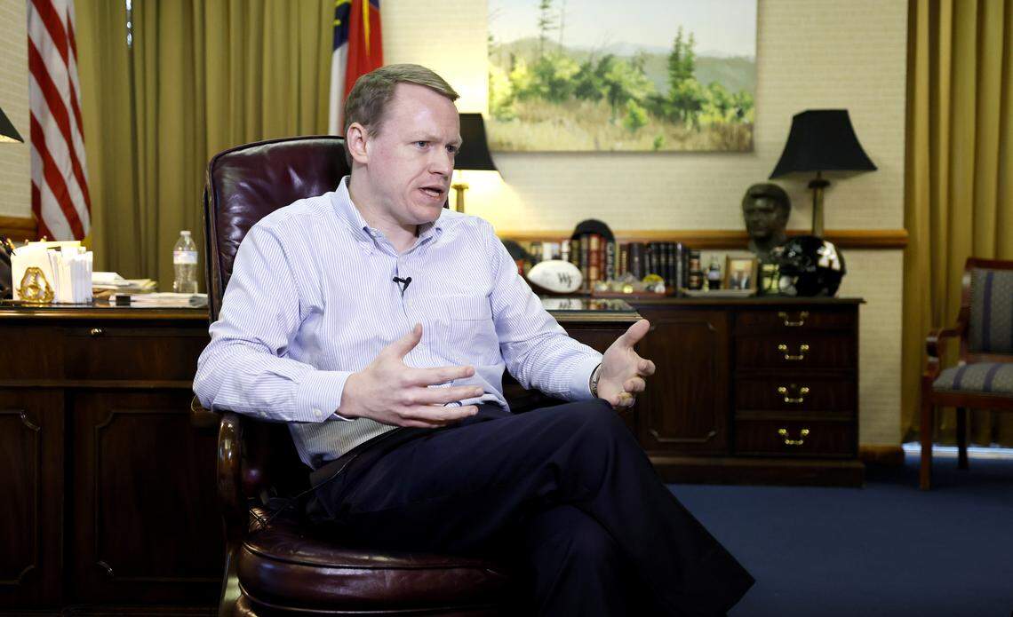 Republican House Speaker Destin Hall answers a question while being interviewed in his office in the Legislative Building in Raleigh, N.C., Wednesday, Nov. 19, 2025.