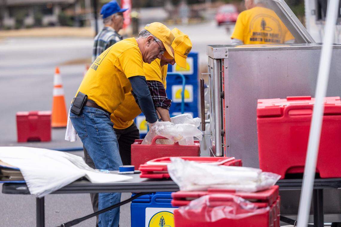 Volunteers with a N.C. Baptists&nbsp;on Mission&nbsp;disaster relief crew prepare meals for people effected by power outages in Moore County Tuesday, Dec. 6, 2022 at the First Baptist Church of Pinehurst . Two deliberate attacks on electrical substations in Moore County Saturday evening caused days-long power outages for tens of thousands of customers.