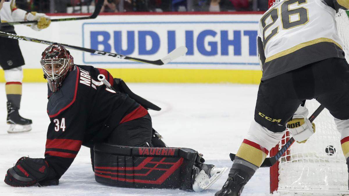 Vegas Golden Knights center Paul Stastny (26) scores against Carolina Hurricanes goaltender Petr Mrazek (34) during the first period Friday.