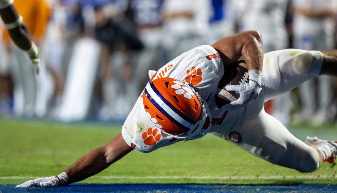 Clemson’s Will Shipley (1) lands in the zone after a 2 yard pass from quarterback Cade Klubnik (2) to give the Tigers a 7-6 lead over Duke in the second quarter on Monday, September 4, 2023 at Wallace Wade Stadium Stadium in Durham, N.C.