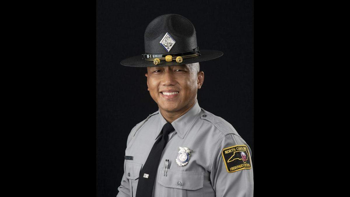 A stunning video shows Trooper Cody E. Thao risking his life by driving in front of a fugitive wrong-way driver in a Raleigh chase.