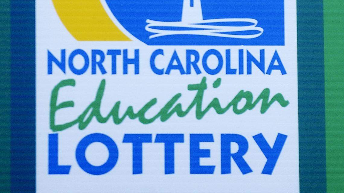 The woman told officials she would use the big win to buy a house. (AP Photo/Sara D. Davis)