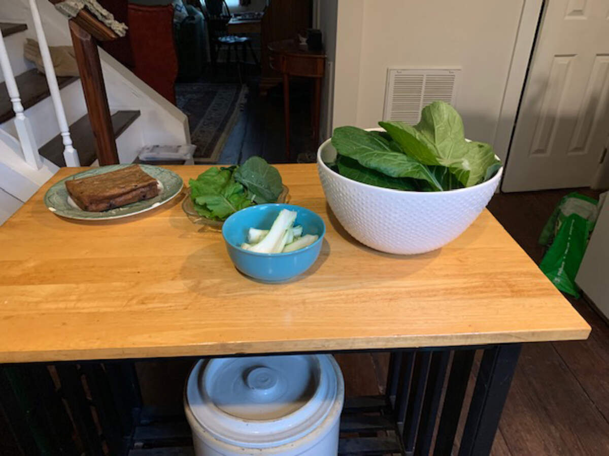 Anne Kepplinger ate fresh greens from the garden she has planted during the pandemic.
