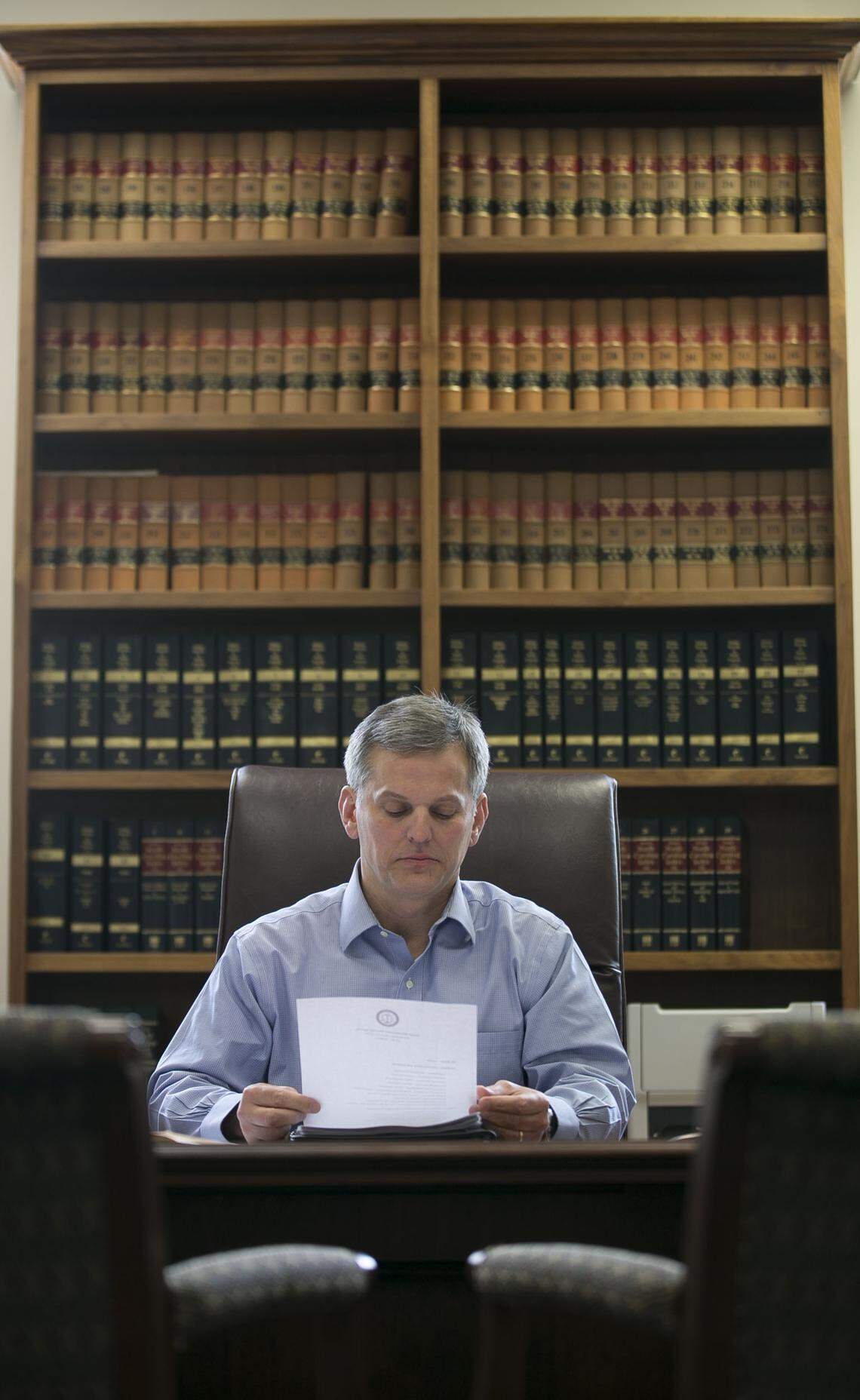 After a luncheon roundtable in Research Triangle Park, North Carolina Attorney General Josh Stein works in his office on Edenton Street in downtown Raleigh, N.C. on Wednesday, April 11, 2018.