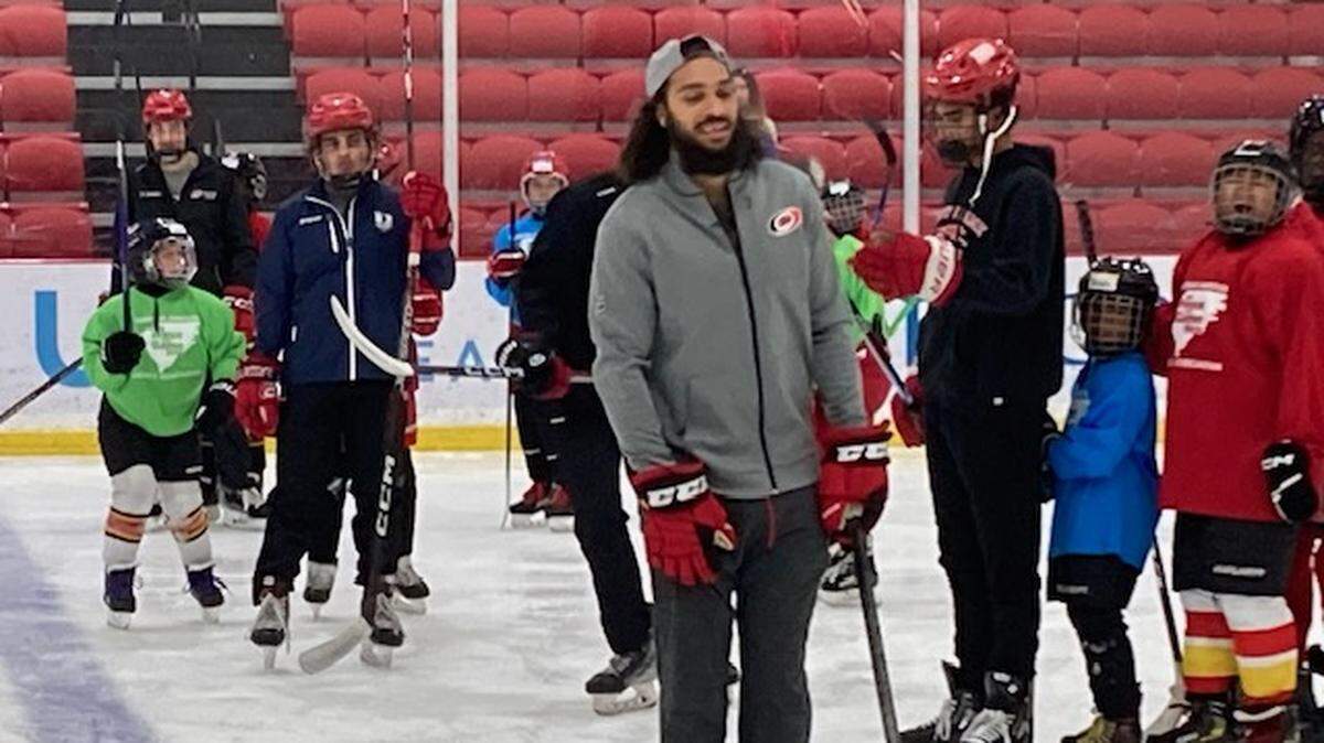 Carolina Hurricanes defenseman Jalen Chatfield makes guest appearance at Hockey Players of Color youth camp in Morrisville on July 27, 2024.