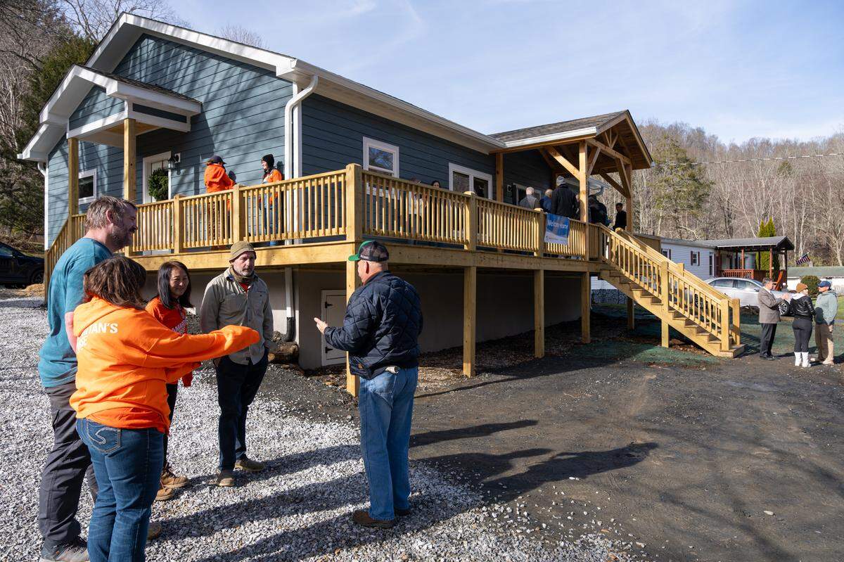 The Tatum family and Samaritan’s Purse celebrate a new house built in Minneapolis, N.C., to replace the 30-year-old home destroyed by Hurricane Helene.