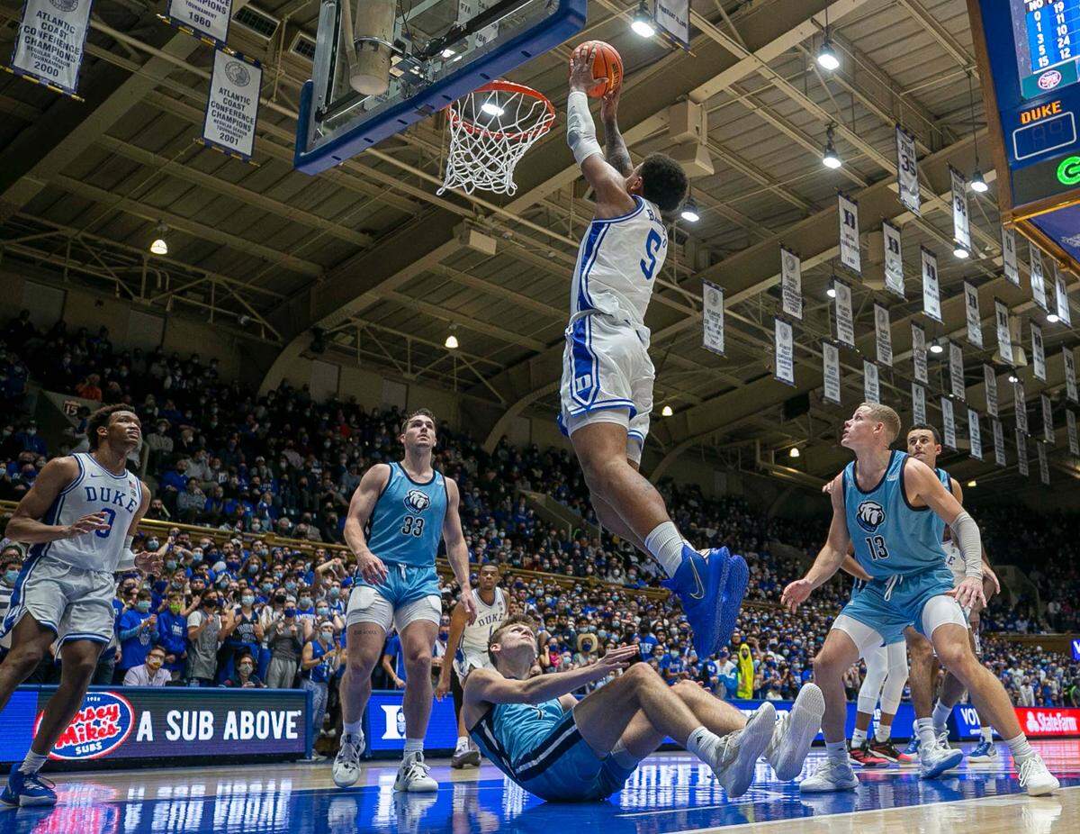 Duke’s Paolo Banchero (5) dunks over Citadel’s Stephen Clark (1) during the second half on Monday, November 22, 2021 at Cameron Indoor Stadium in Durham, N.C.