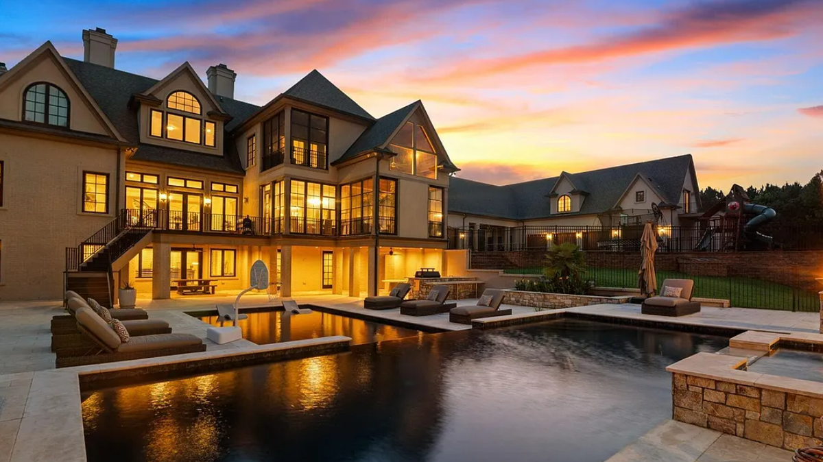 A Zillow ad shows the North Raleigh mansion once owned by a Ponzi schemer renovated and selling for $6 million.