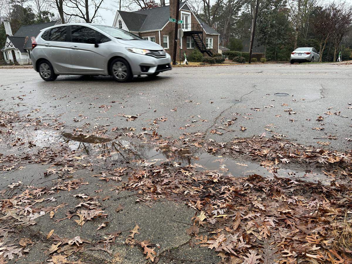 Puddles and wet roads like these in Raleigh on Monday afternoon are expected to freeze overnight.