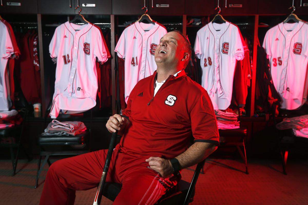N.C. State head baseball coach Elliott Avent poses in the locker room at Doak Field in Raleigh, N.C., Thursday, Feb. 18, 2016.