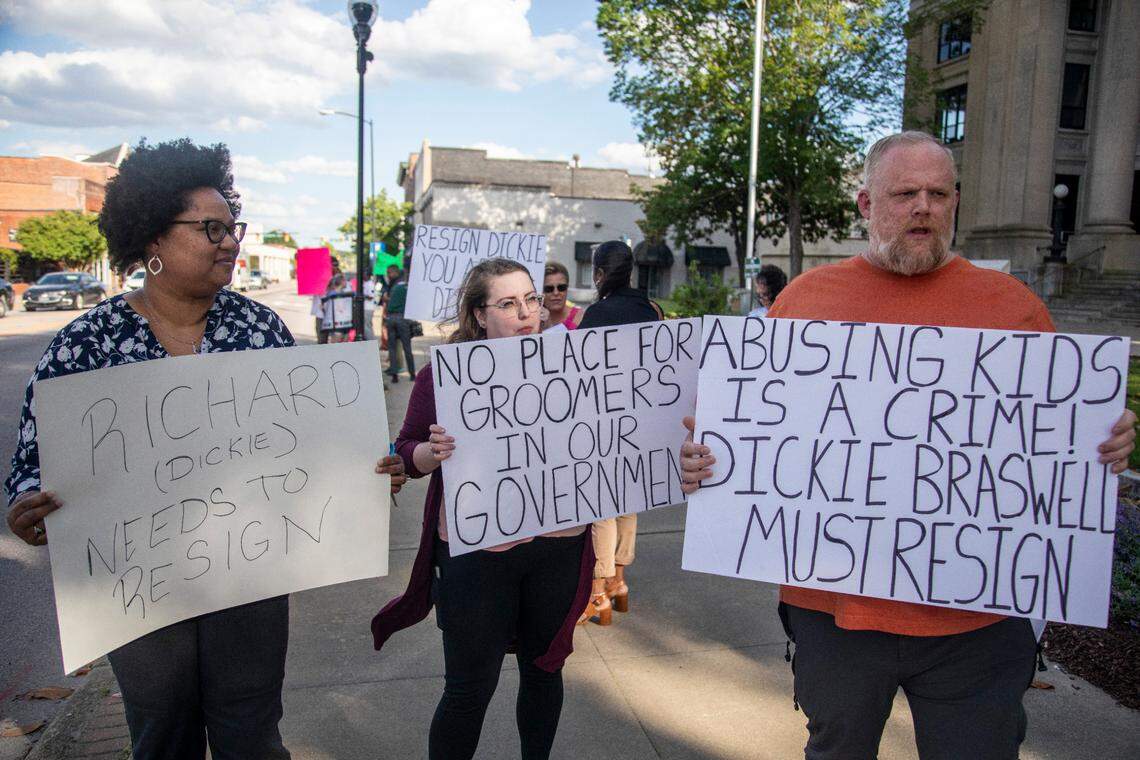 Some demonstrators call for the resignation of Johnston County Commissioner Richard “Dickie” Braswell prior to a Johnston County Board of Commissioners meeting at the Johnson County Courthouse in Smithfield on Monday, May, 1, 2023. Braswell, 74, was arrested last June after a 13-year-old girl told officers at the Johnston County Sheriff’s Office that she had an “inappropriate interaction with an adult male acquaintance.”