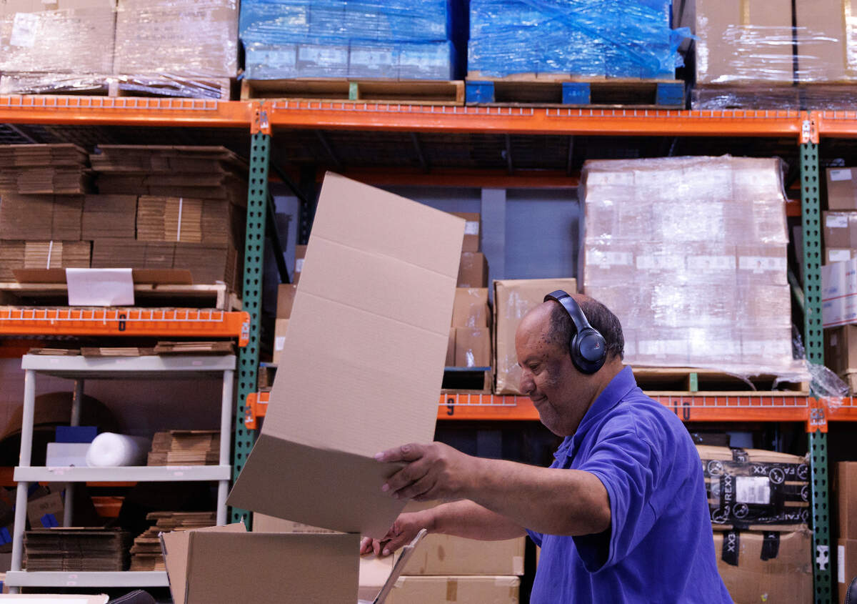 Karl Lantelme works at Gabi’s PALS (Packaging, Assembling, Labeling and Shipping) on Friday, June 20, 2025, in Raleigh, N.C.