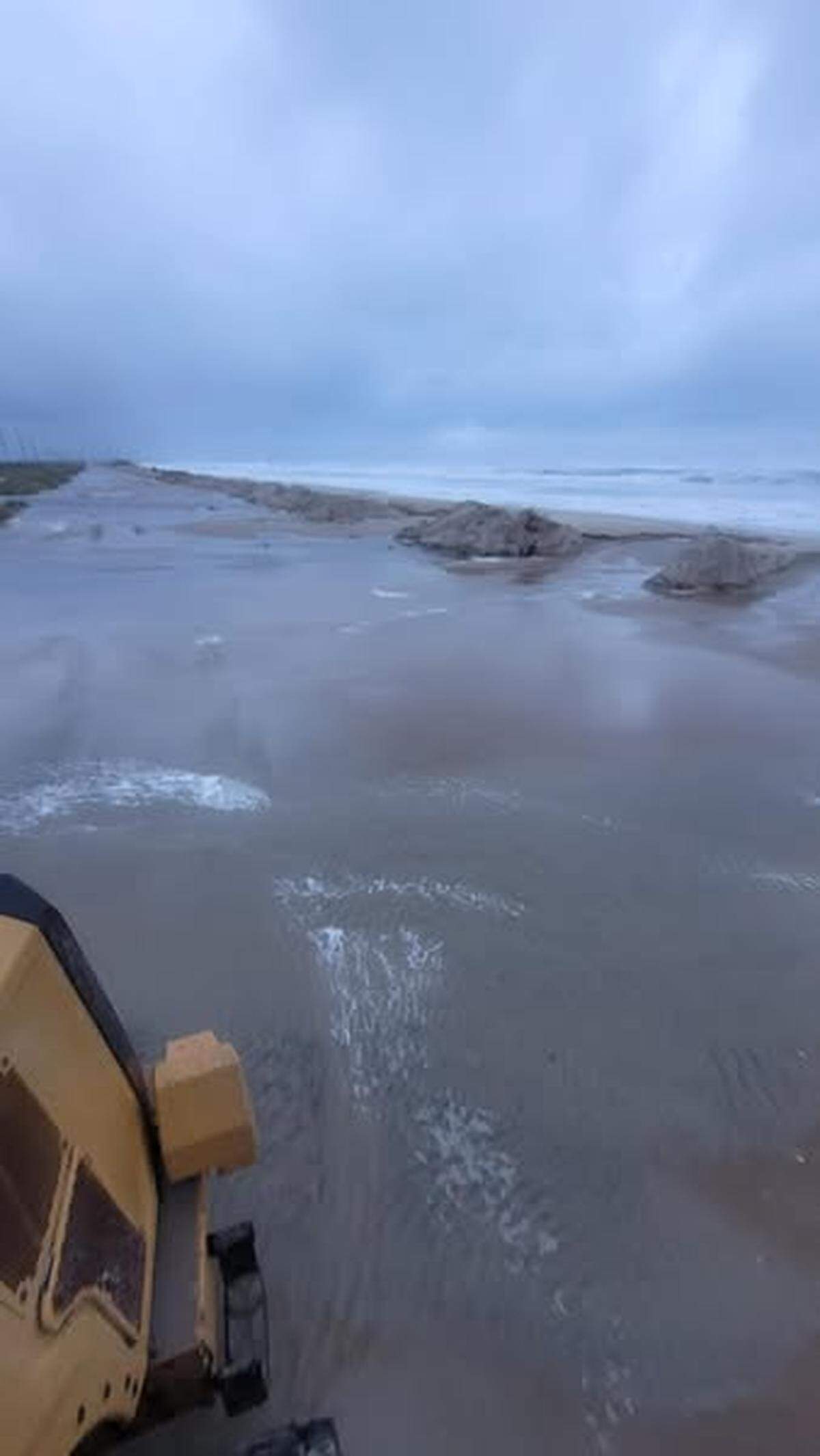 A flooded section of N.C. 12 on the Outer Banks as Hurricane Erin skirts the coast of North Carolina.