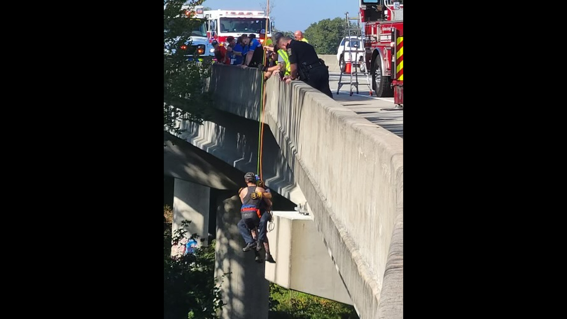 A man was rescued after falling off a bridge during a triathlon in Wilmington, North Carolina, officials said.