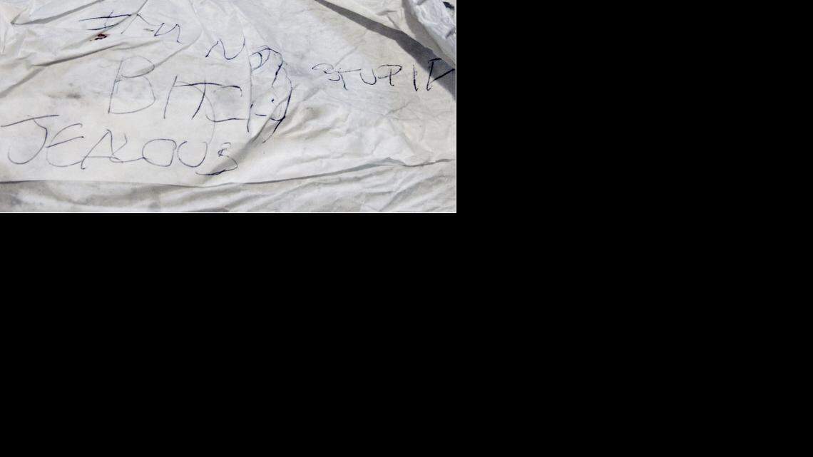 This note was written on a take-out fast-food bag found on the bed near the body of Faith Hedgepeth.
