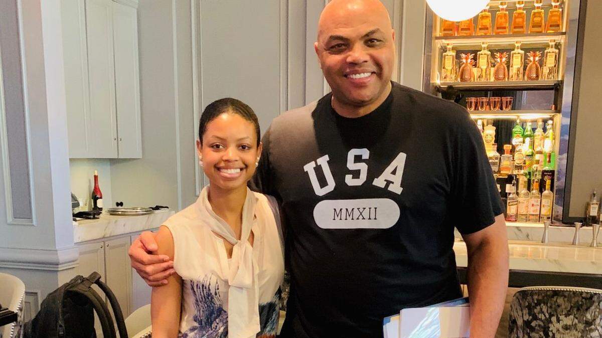 NeuroVice CEO and founder Ashlyn Sanders is pictured with NBA legend and angel investor Charles Barkley, one of the first investors in her company.
