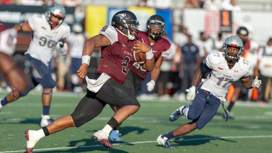 North Carolina Central quarterback Chauncey Caldwell picks up yardage with his legs against Howard Saturday in Durham. Caldwell accounted for 464 yards of total offense and four touchdowns during the Eagles 40-35 win.