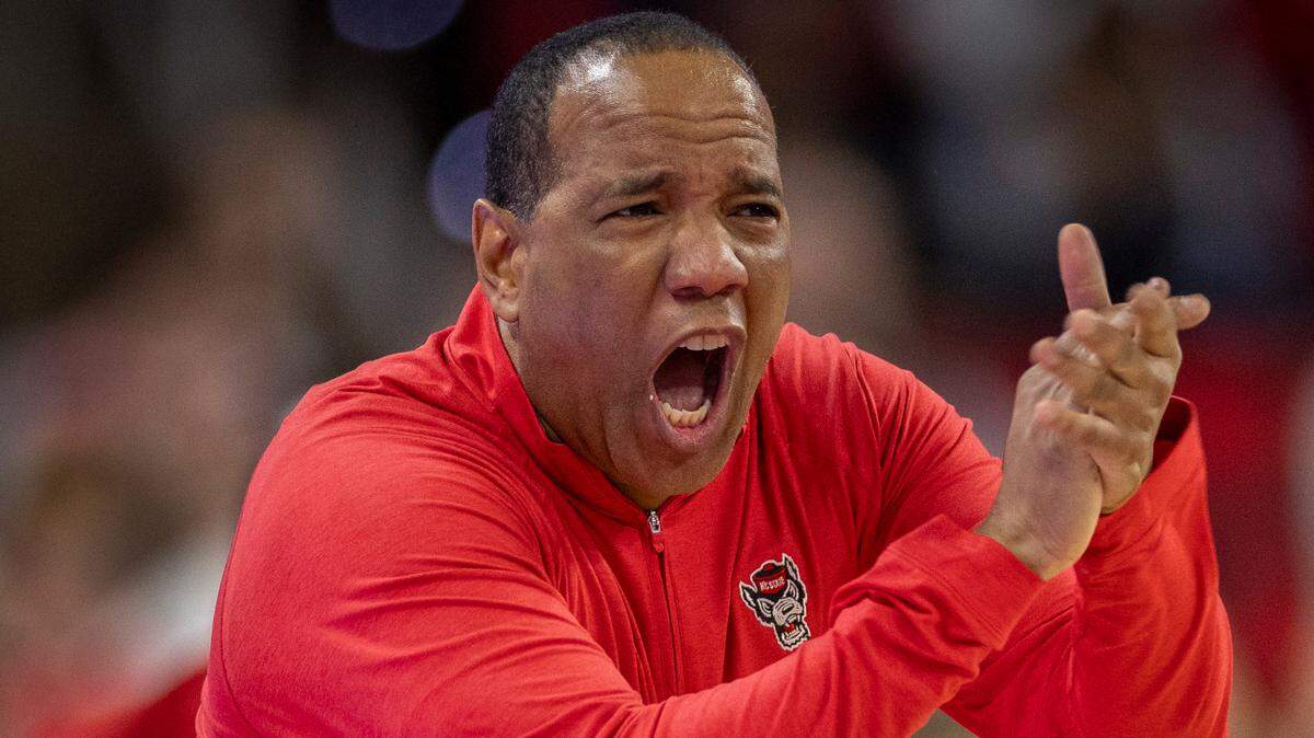 N.C. State coach Kevin Keatts encourages his players after they cut the Syracuse lead to two points in the second half against Syracuse on Tuesday, February 20, 2024 at PNC Arena in Raleigh, N.C.