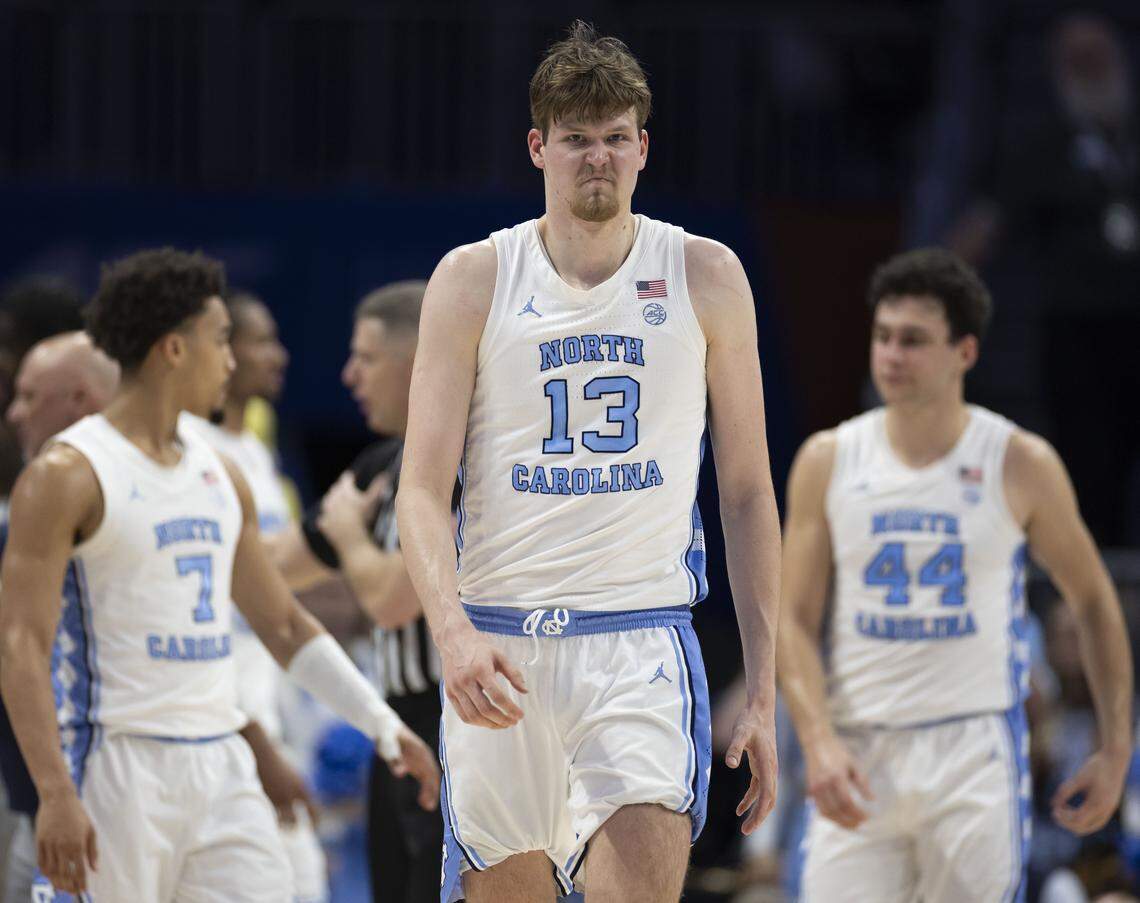 North Carolina center Henri Veesaar (13) grimaces as he takes the court in the closing minutes of pay following a time-out on Thursday, March 12, 2026, during the quarterfinals of the ACC Tournament at Spectrum Center in Charlotte, N.C.