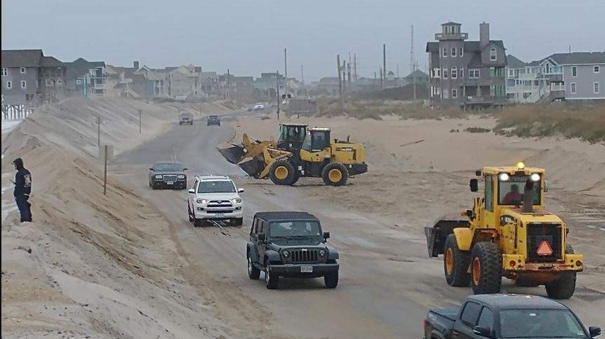 This NCDOT photo was taken Nov. 6, 2021 on Highway 12 in the Outer Banks before a nor’easter hit. Crews were trying to intervene as high winds and high tides began causing issues. The road closed Nov. 7 and remained closed for two days until crews could remove sand overwash.