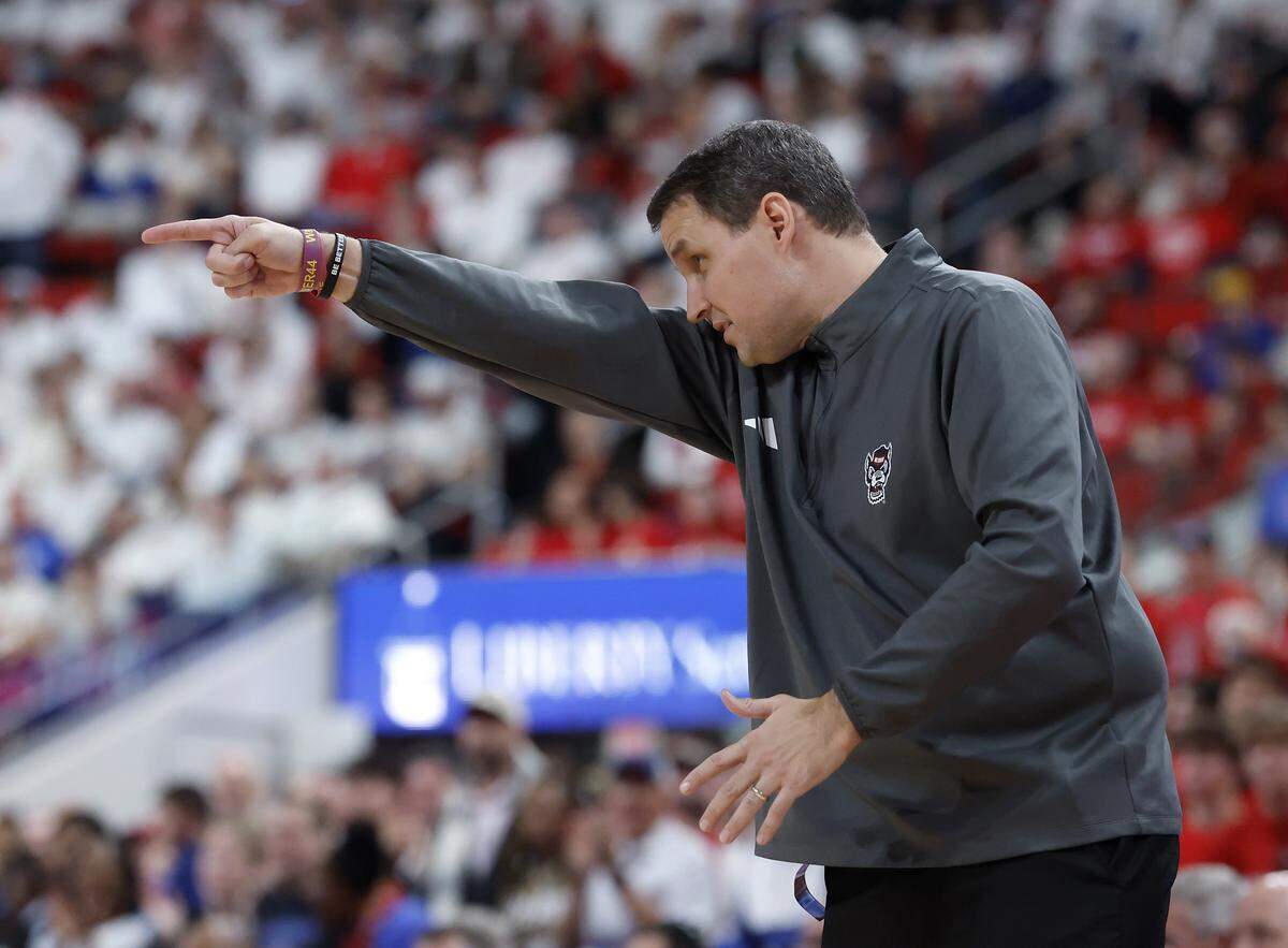 N.C. State head coach Will Wade motions to his team during overtime of the Wolfpack’s 77-76 loss to Kansas on Saturday, Dec. 13, 2025, at Lenovo Center in Raleigh, N.C.